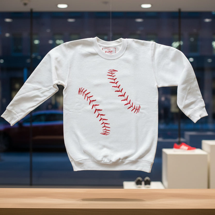 White sweatshirt with red baseball design on a white background